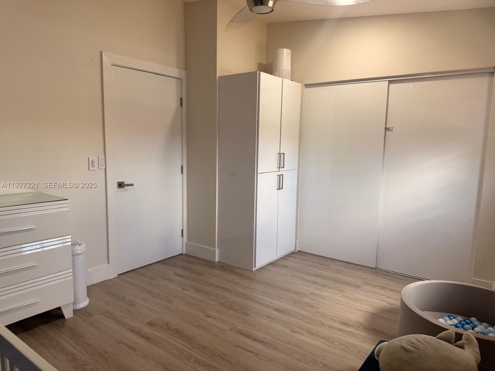 6864 Northwest 166th Terrace, Unit 903 Miami Lakes, FL 33014 - Photo 24 of 29 a bathroom with a shower and a toilet