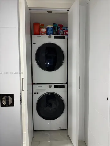 a utility room with dryer and washer