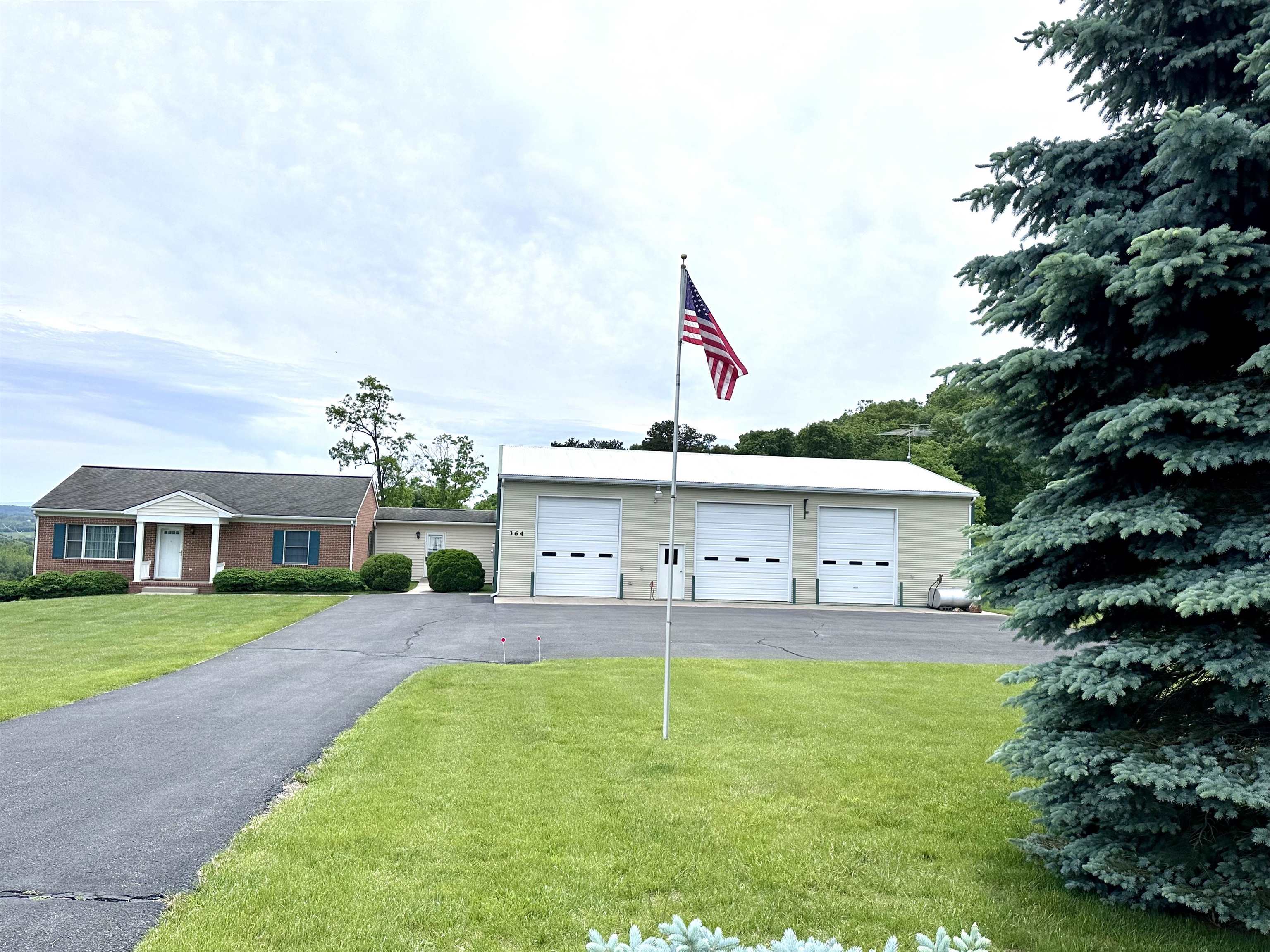 364 Summit Church Road Bridgewater, VA 22812 - Photo 1 of 32 a view of a house with a big yard and potted plants
