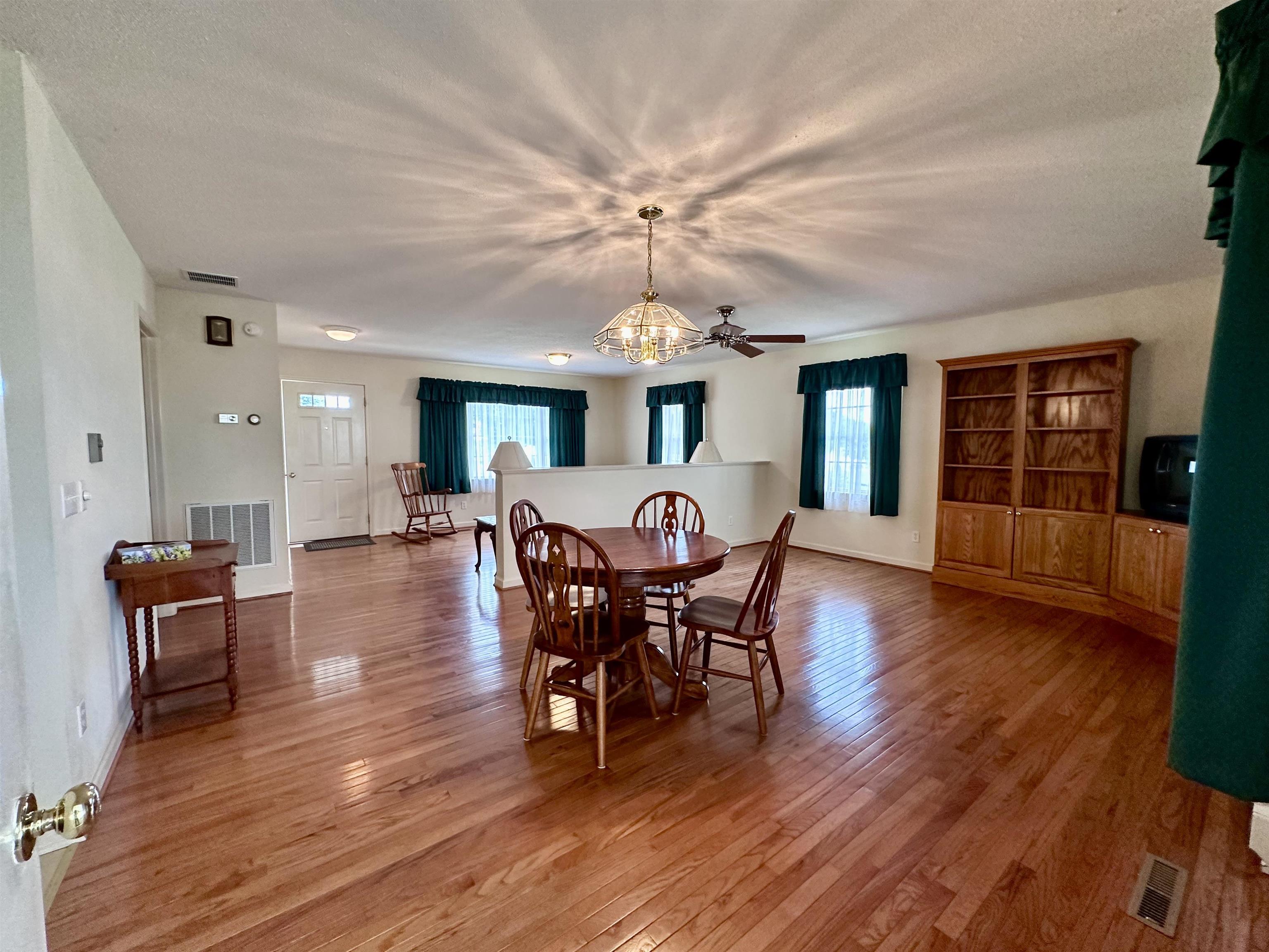 364 Summit Church Road Bridgewater, VA 22812 - Photo 9 of 32 a view of a dining room with furniture window and wooden floor