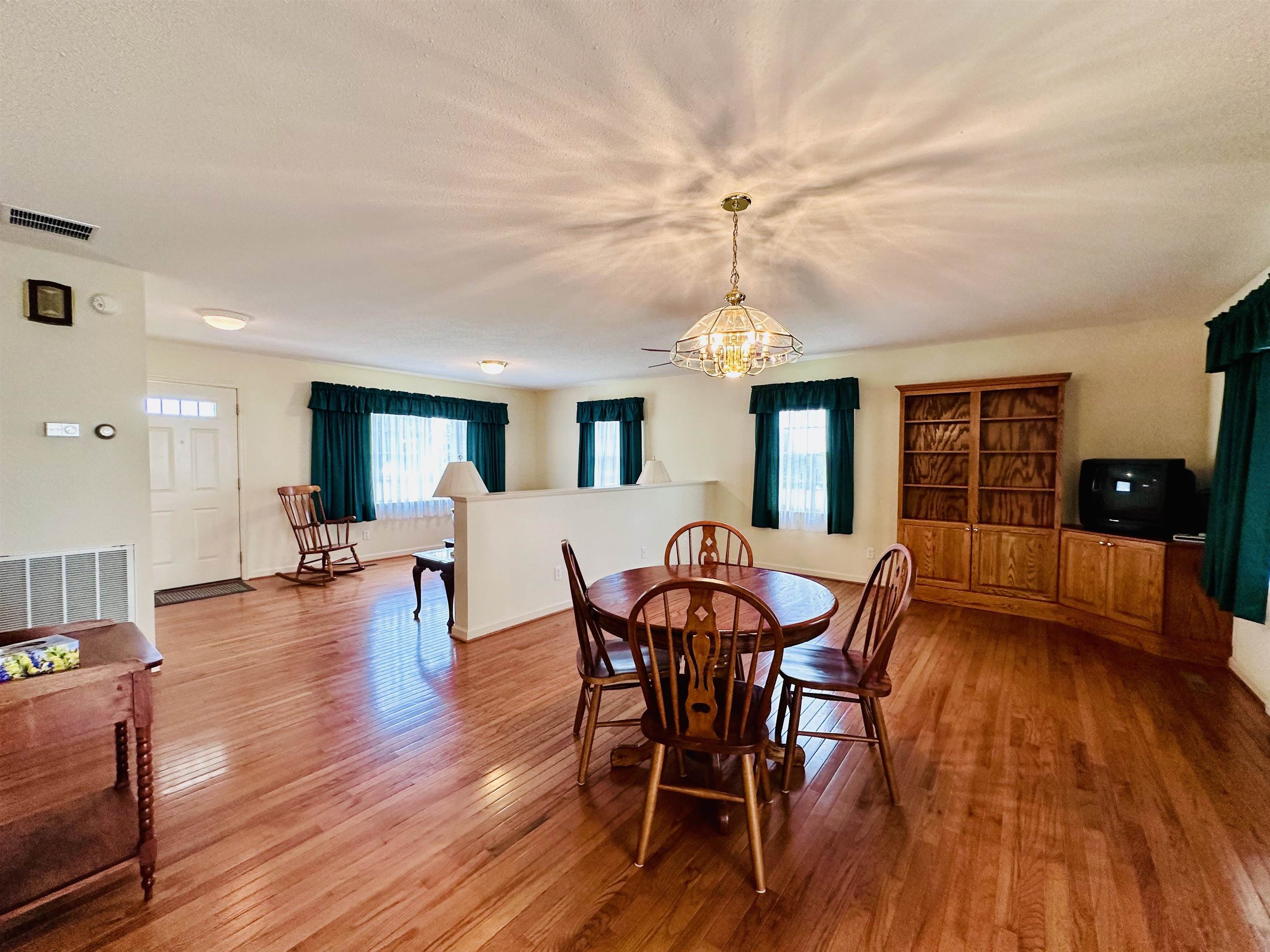 364 Summit Church Road Bridgewater, VA 22812 - Photo 10 of 32 a view of a dining room with furniture and wooden floor