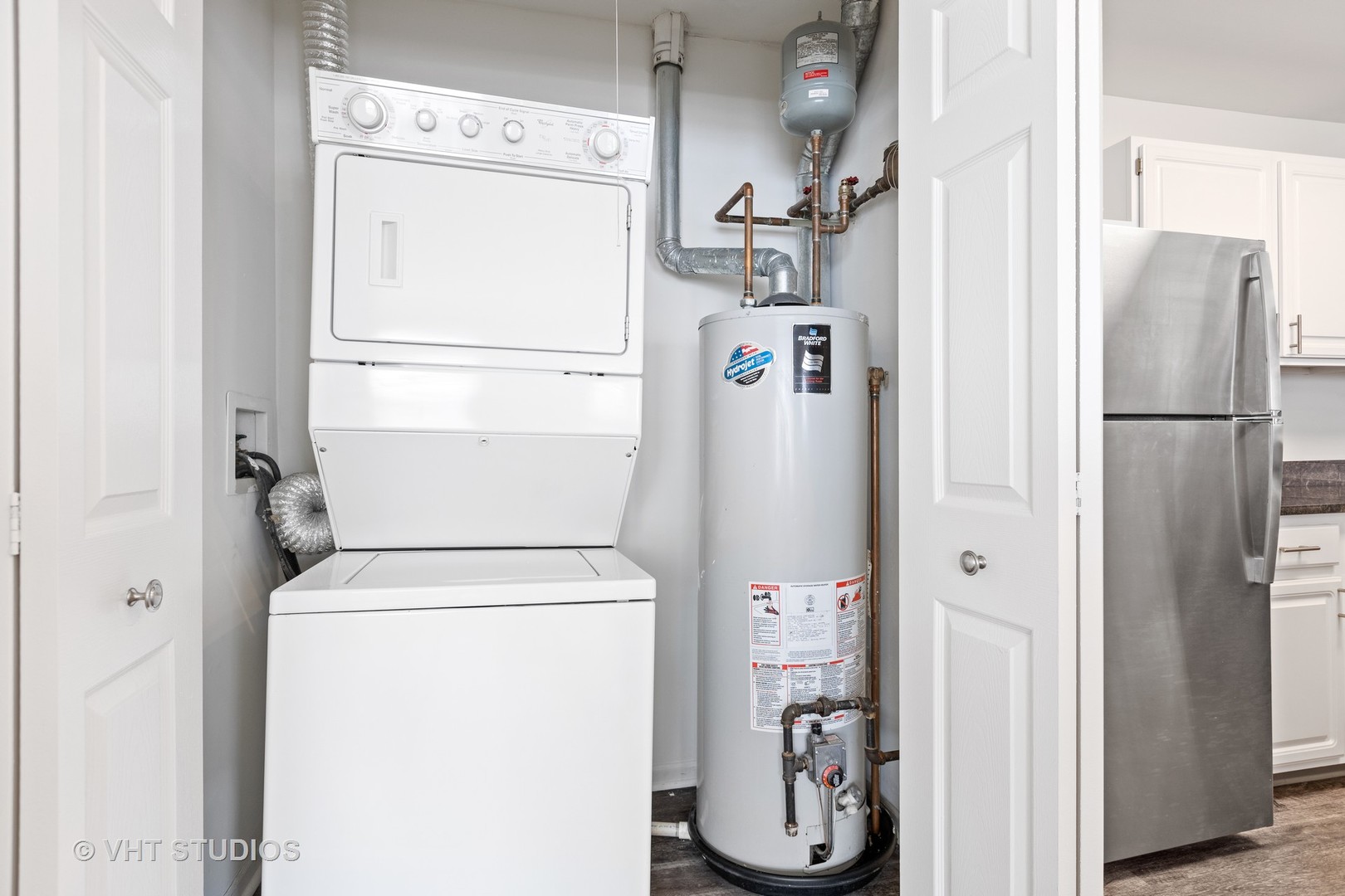 84 Gershwin Court, Unit 84 Wheaton, IL 60189 - Photo 52 of 60 a utility room with dryer and washer