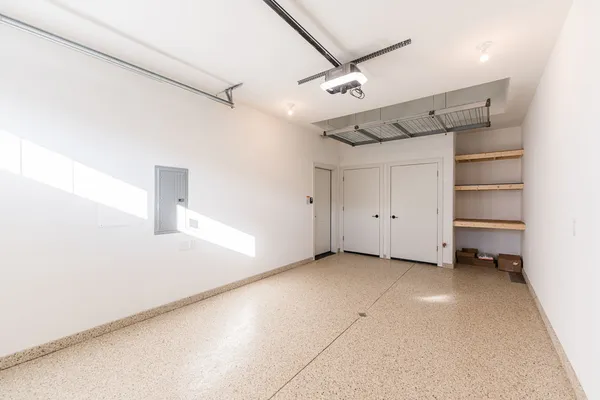 a living room with furniture a rug and a large window