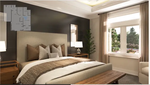 a bedroom with a large bed and a large window