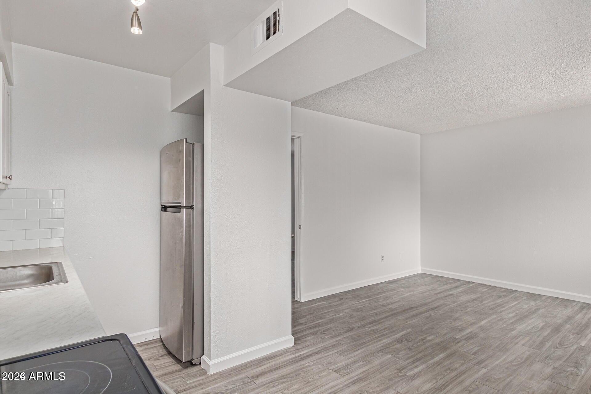 1029 South Wilson Street, Unit 14 Tempe, AZ 85281 - Photo 6 of 12 a view of an empty room