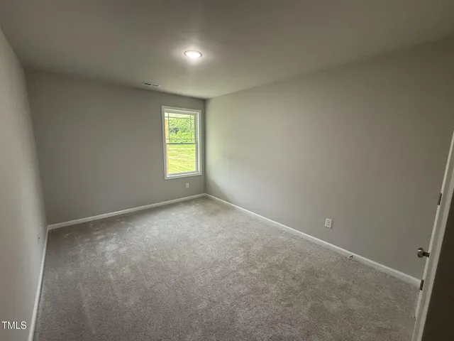 a view of empty room with window