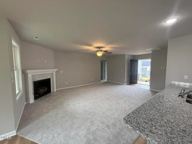 a view of a livingroom with a fireplace