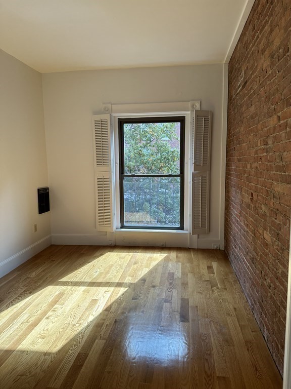 29 Bay State Road, Unit 3 Boston, MA 02215 - Photo 16 of 22 a view of an empty room and window