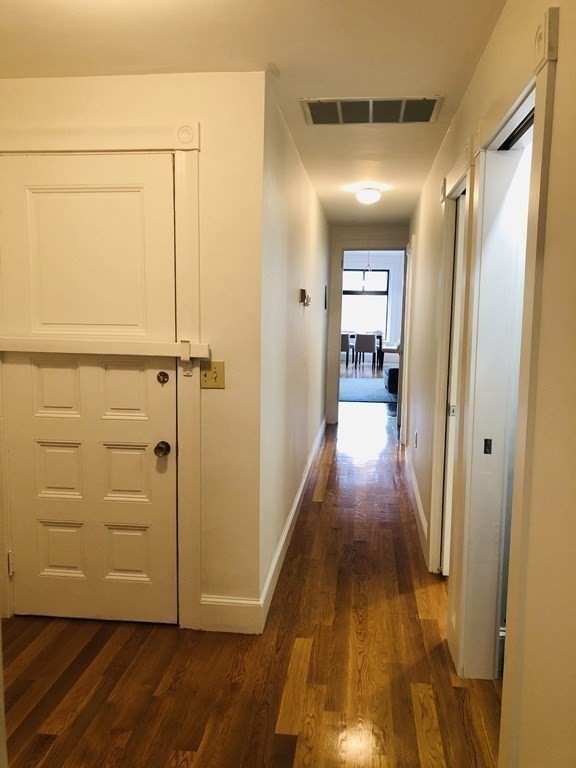 29 Bay State Road, Unit 3 Boston, MA 02215 - Photo 20 of 22 a view of gallery with wooden floor