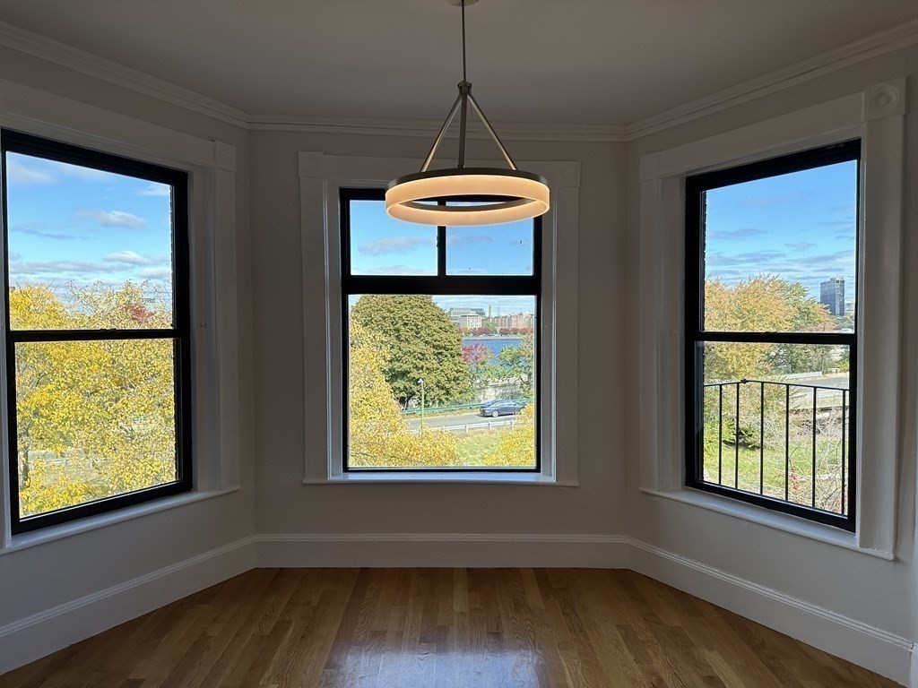 29 Bay State Road, Unit 3 Boston, MA 02215 - Photo 2 of 22 a view of a room with wooden floor and windows