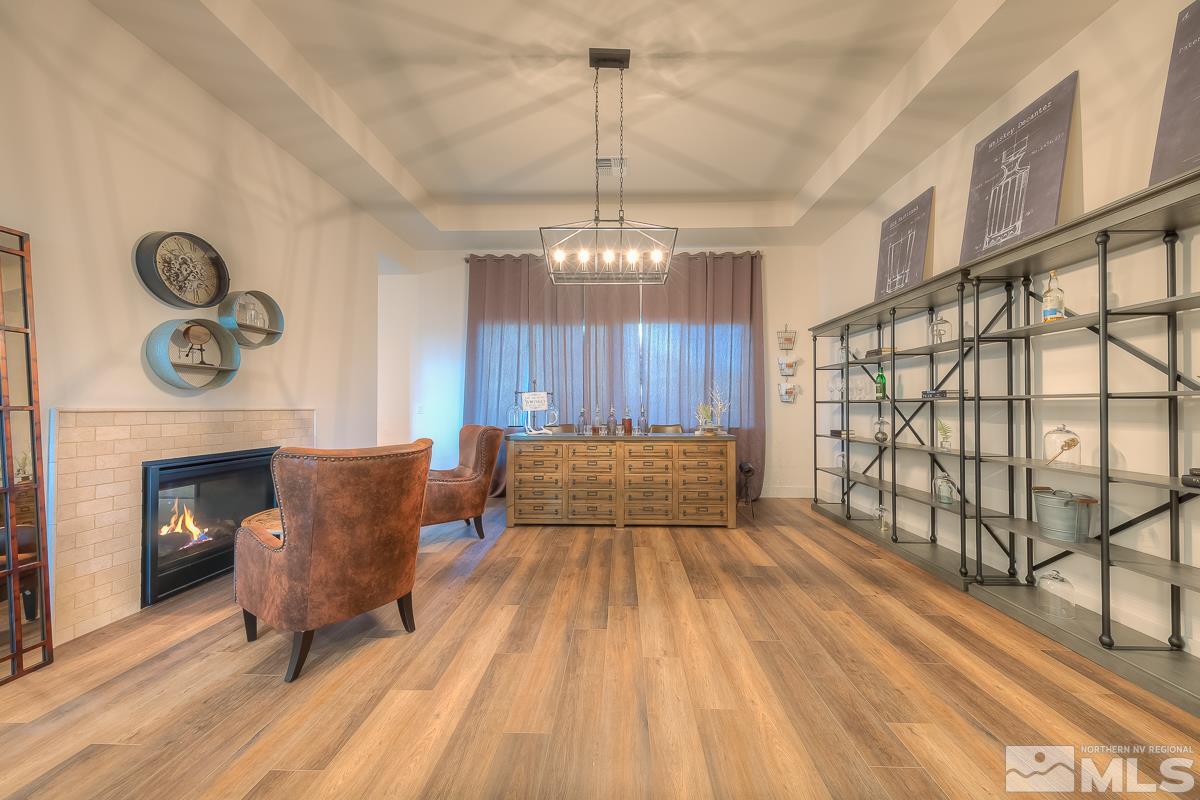 3018 Copper Stone Drive Reno, NV 89521 - Photo 12 of 29 a living room with furniture and a fireplace