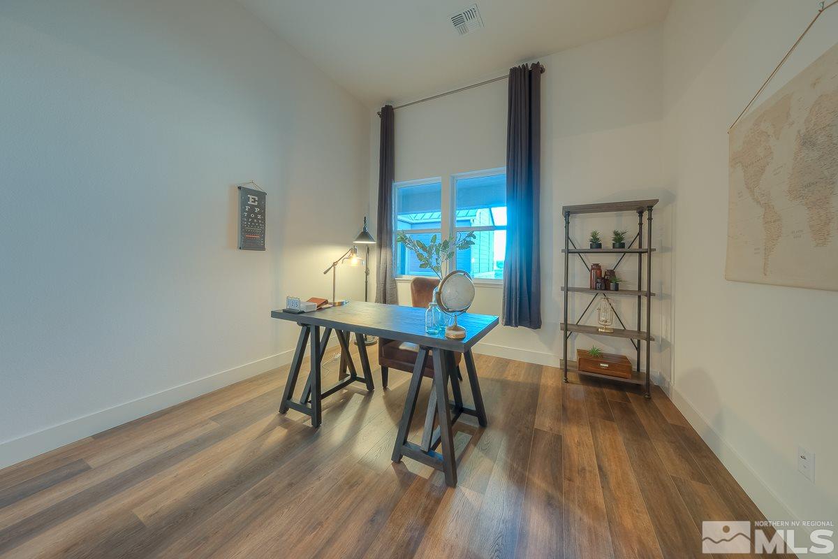 3018 Copper Stone Drive Reno, NV 89521 - Photo 14 of 29 a workspace room with furniture and wooden floor