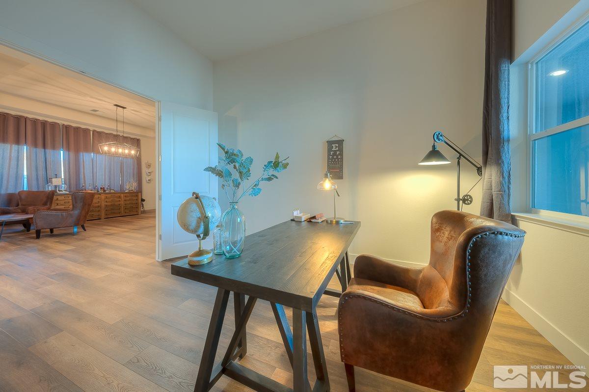3018 Copper Stone Drive Reno, NV 89521 - Photo 15 of 29 a living room with furniture and a potted plant
