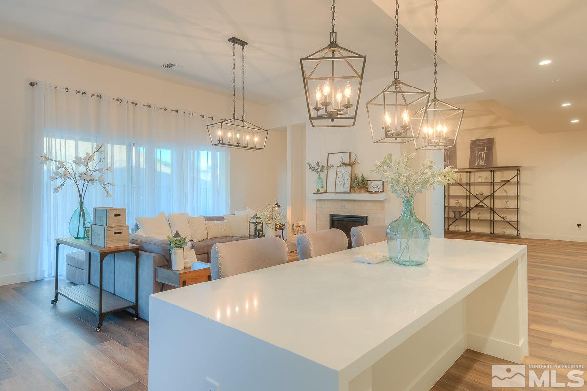 3018 Copper Stone Drive Reno, NV 89521 - Photo 24 of 29 a large white kitchen with a large island