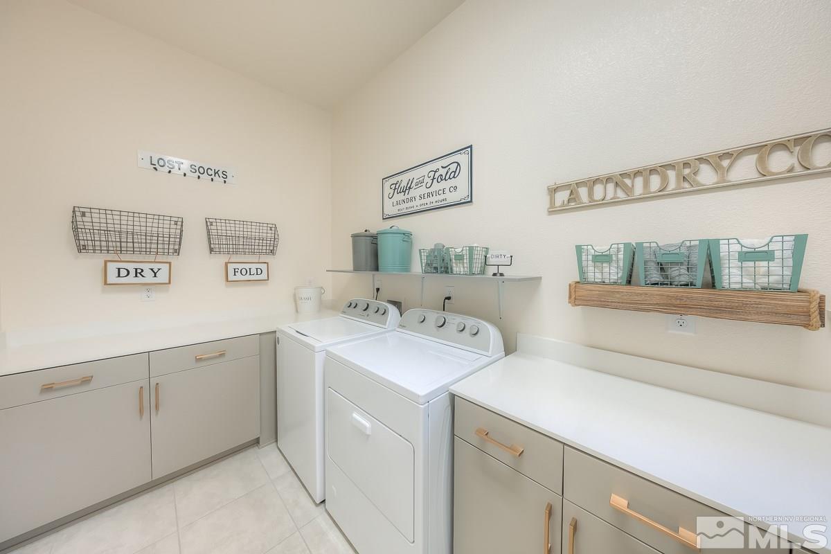 3018 Copper Stone Drive Reno, NV 89521 - Photo 26 of 29 a view of a bathroom with a sink and a window