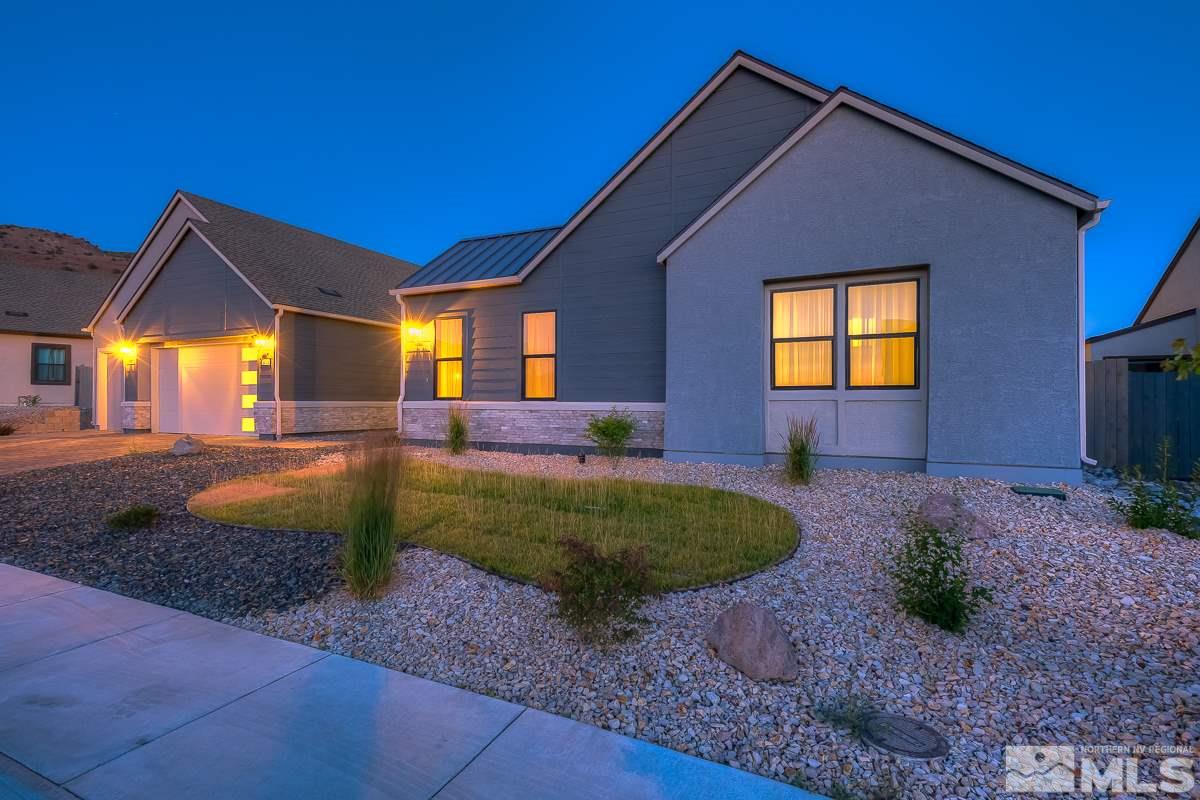 3018 Copper Stone Drive Reno, NV 89521 - Photo 29 of 29 a view of a house with backyard and swimming pool