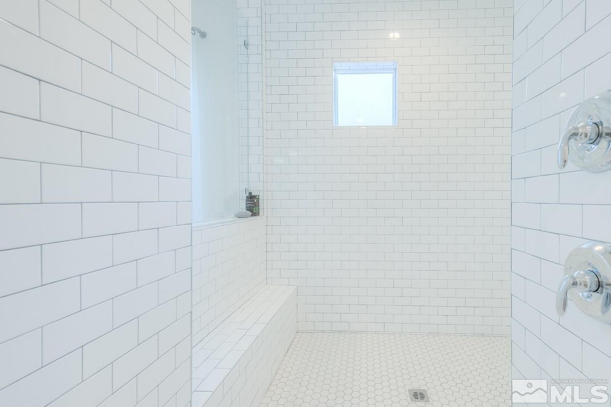 3018 Copper Stone Drive Reno, NV 89521 - Photo 3 of 29 a bathroom with a bathtub