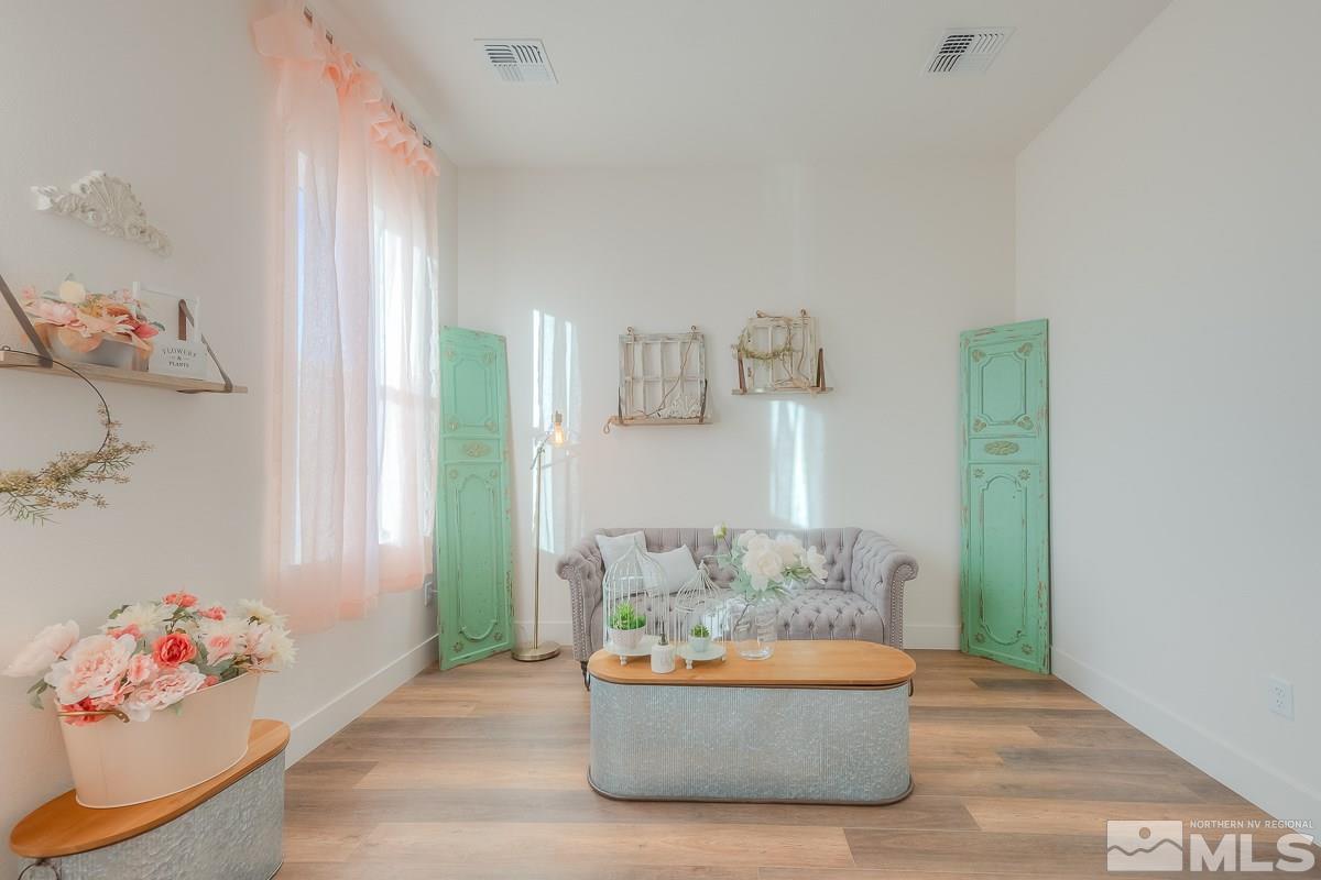 3018 Copper Stone Drive Reno, NV 89521 - Photo 8 of 29 a living room with furniture and a window