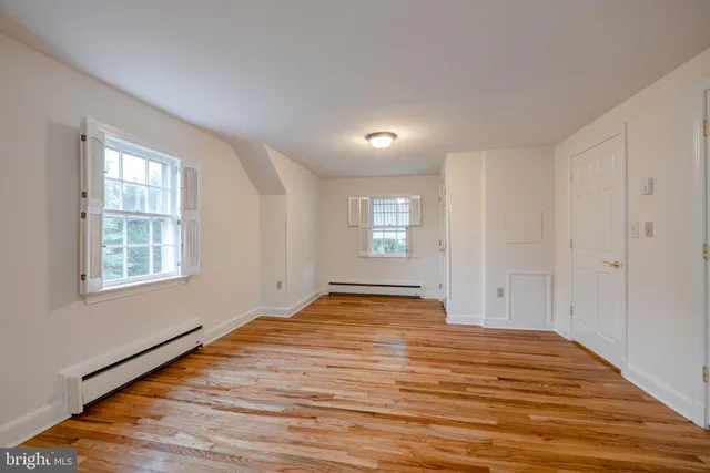 a bathroom with a sink and a shower