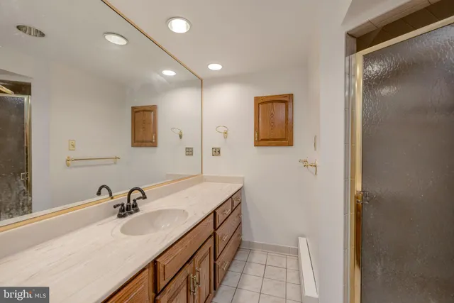 a kitchen with a stove top oven sink and cabinets