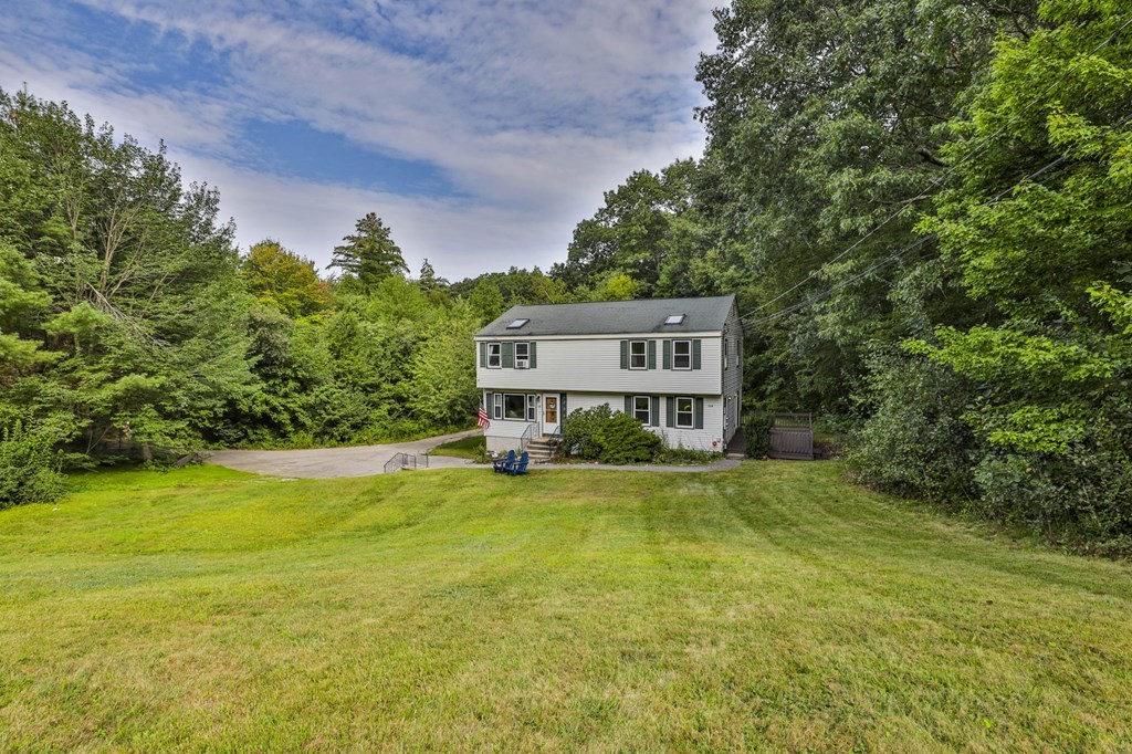 12 Al Derry Nh 03038, Unit R Derry, NH 03038 - Photo 1 of 23 a view of a house with a big yard and large trees