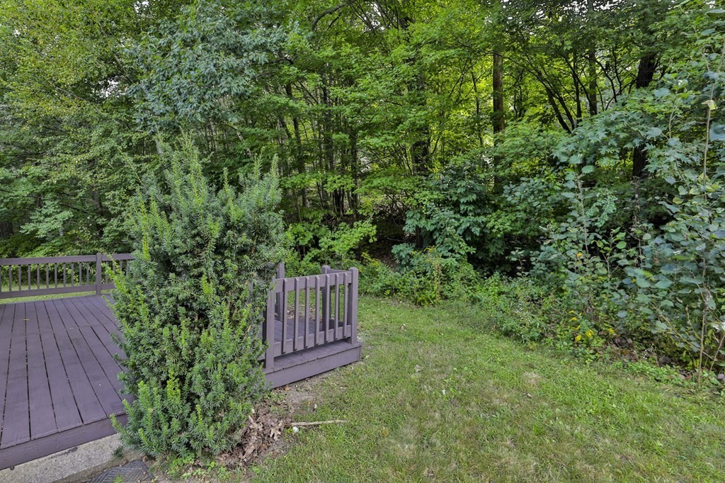 12 Al Derry Nh 03038, Unit R Derry, NH 03038 - Photo 20 of 23 a view of a back yard