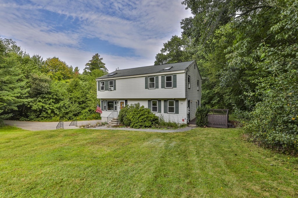 12 Al Derry Nh 03038, Unit R Derry, NH 03038 - Photo 23 of 23 a front view of a house with a yard