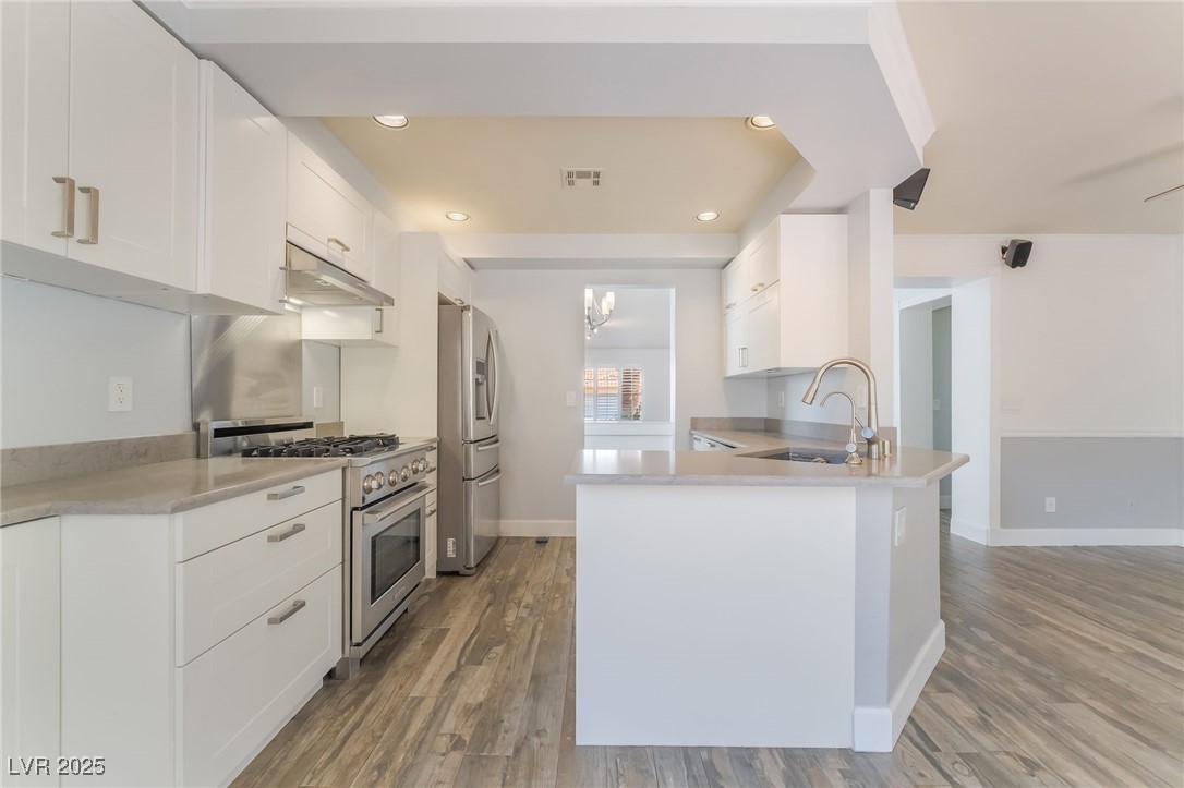 1427 Pathfinder Road Henderson, NV 89014 - Photo 15 of 36 Quartz counters and custom cabinets