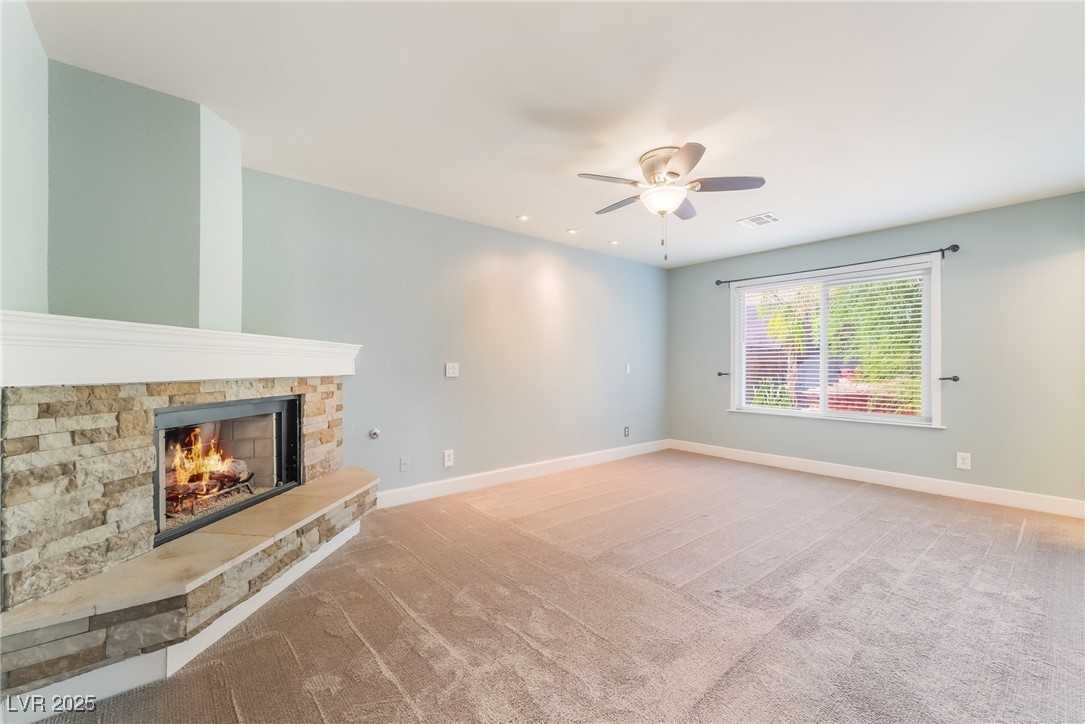 1427 Pathfinder Road Henderson, NV 89014 - Photo 19 of 36 Custom fireplace for ambiance in the bedroom, oh my!