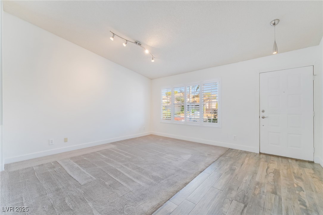 1427 Pathfinder Road Henderson, NV 89014 - Photo 6 of 36 Formal living and plantation shutters