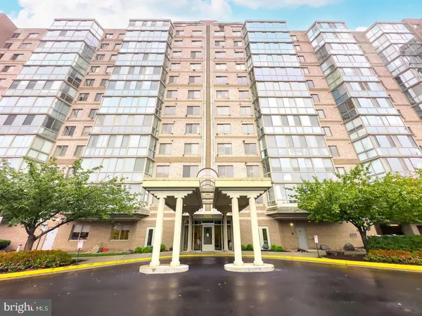 a view of a building with a street