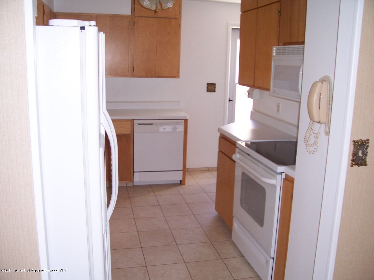 703 West 3rd Street Rifle, CO 81650 - Photo 6 of 22 a utility room with a sink a washer and dryer