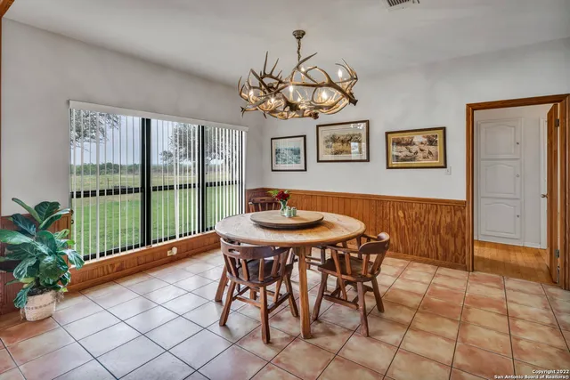 a kitchen that has a sink and a stove in it