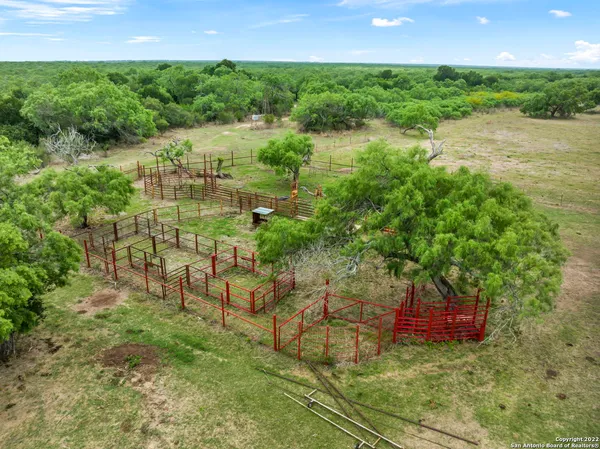 a view of a backyard of the house