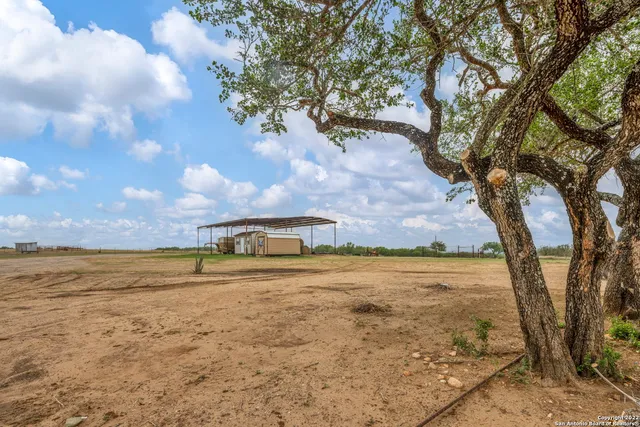 a view of a house with a big yard