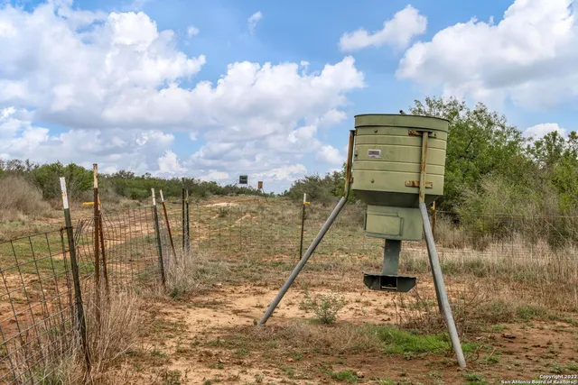 a view of a lake with a big yard