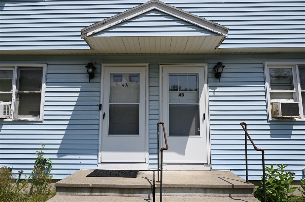 4 Spring Street Rochester, NH 03868 - Photo 25 of 29 a front view of a house