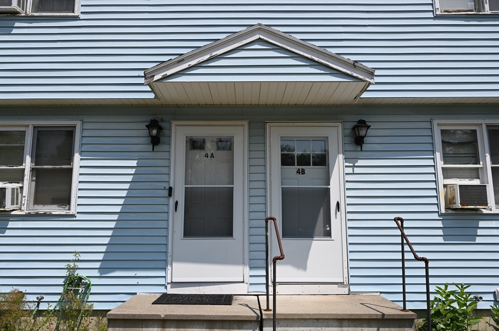 4 Spring Street Rochester, NH 03868 - Photo 29 of 29 a front view of a house