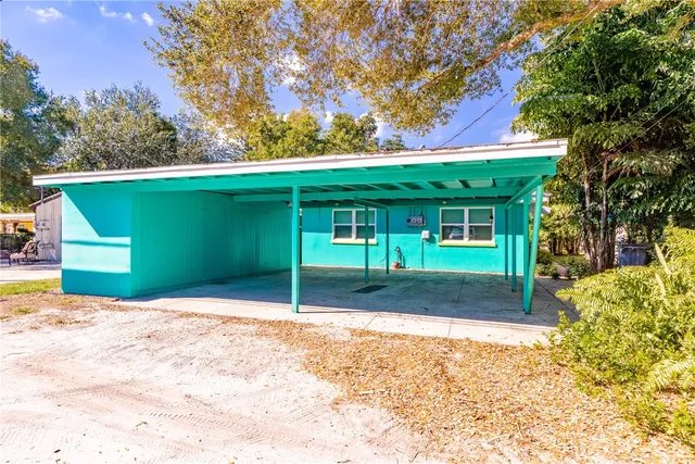 a backyard of a house with lots of green space