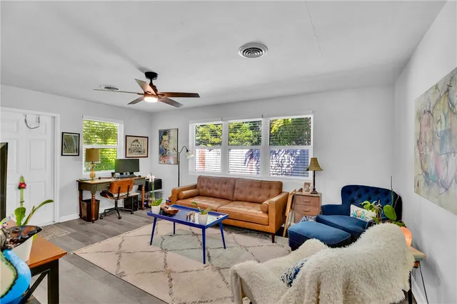 a kitchen with cabinets appliances and a sink