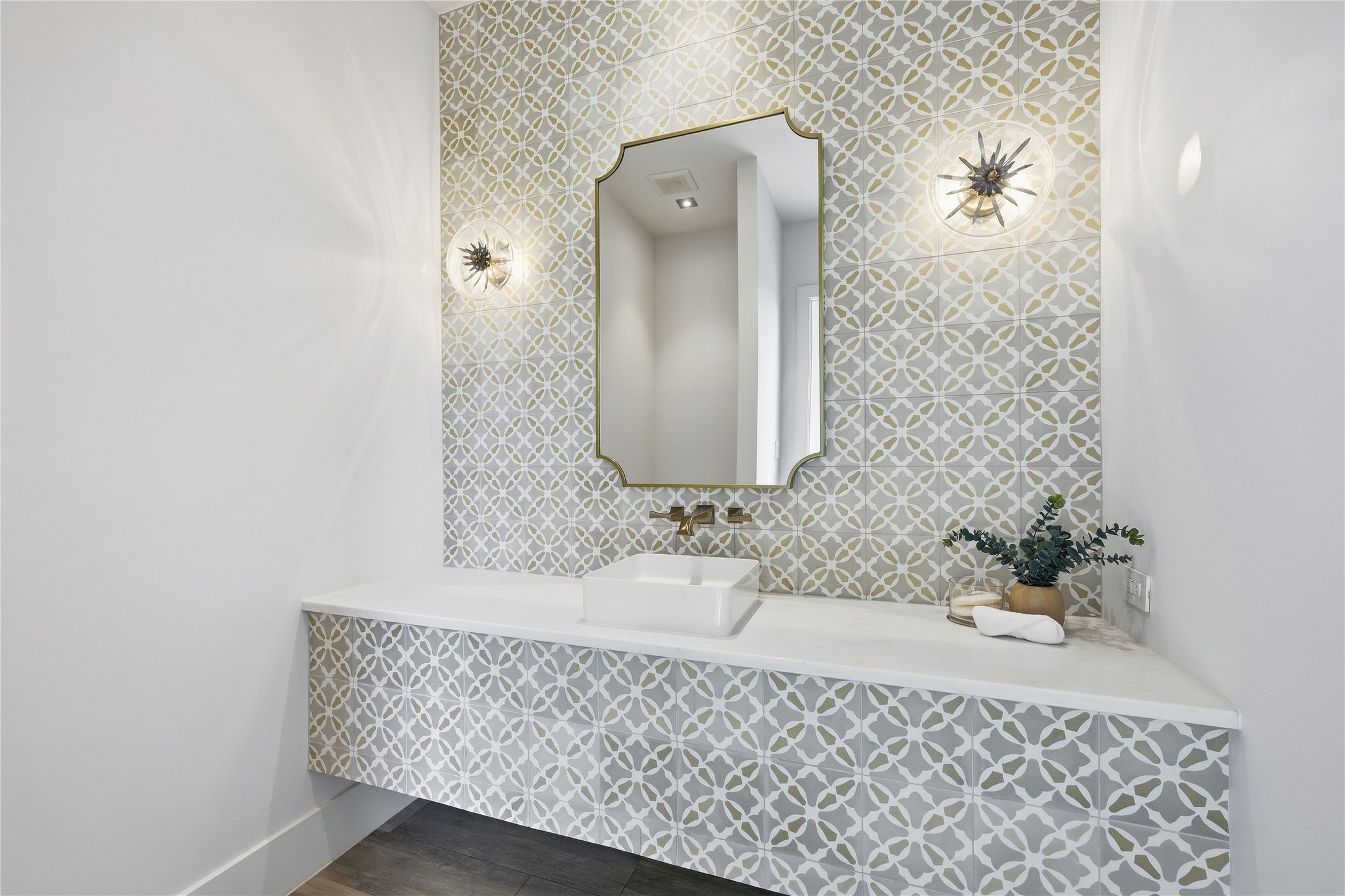 449 Ranch Falls Fair Oaks Ranch, TX 78015 - Photo 35 of 39 Geometric patterned tile creates a striking backdrop for this modern floating vanity space.