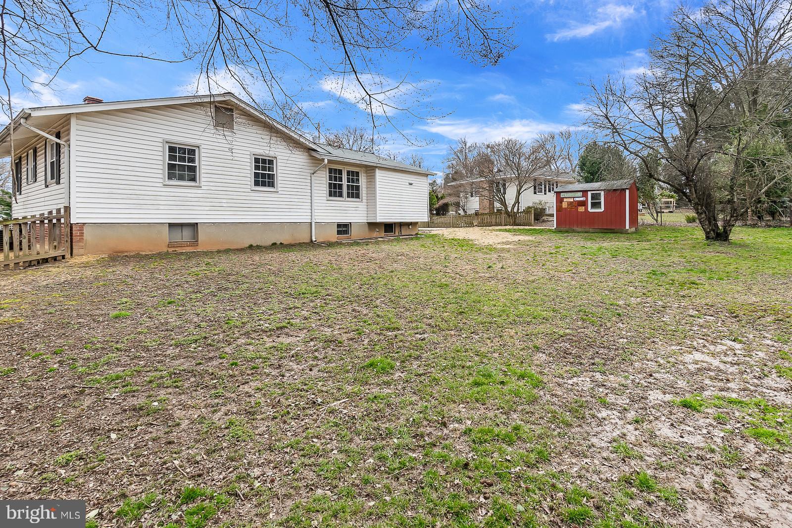 409 Orleans Circle Southwest Vienna, VA 22180 - Photo 20 of 23 a view of a house with a yard
