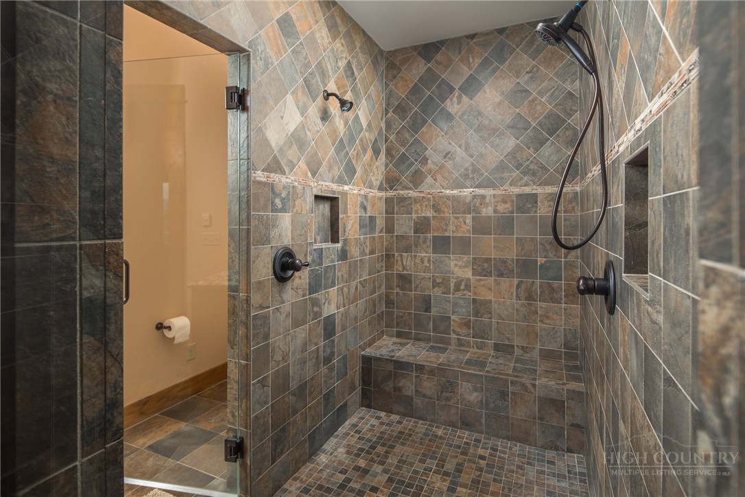115 Passionflower Trail Boone, NC 28607 - Photo 24 of 50 a bathroom with a shower