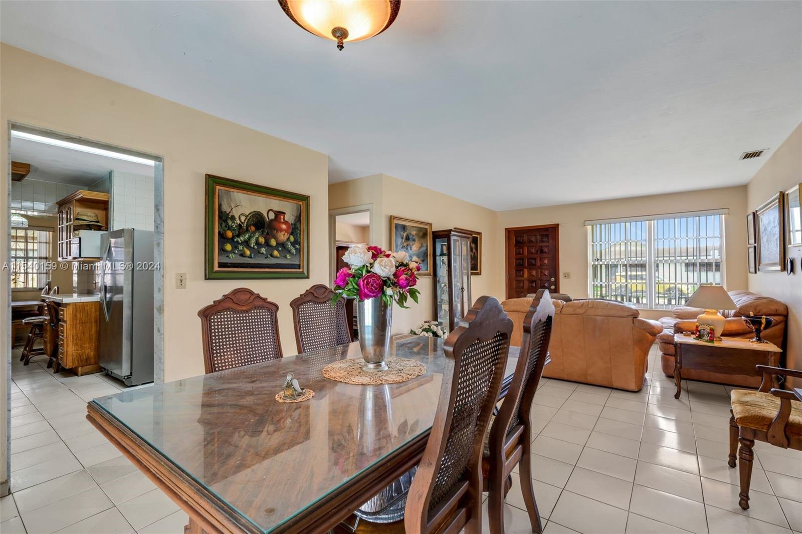 Westchester Miami, FL 33165 - Photo 12 of 30 a dining room with furniture and window