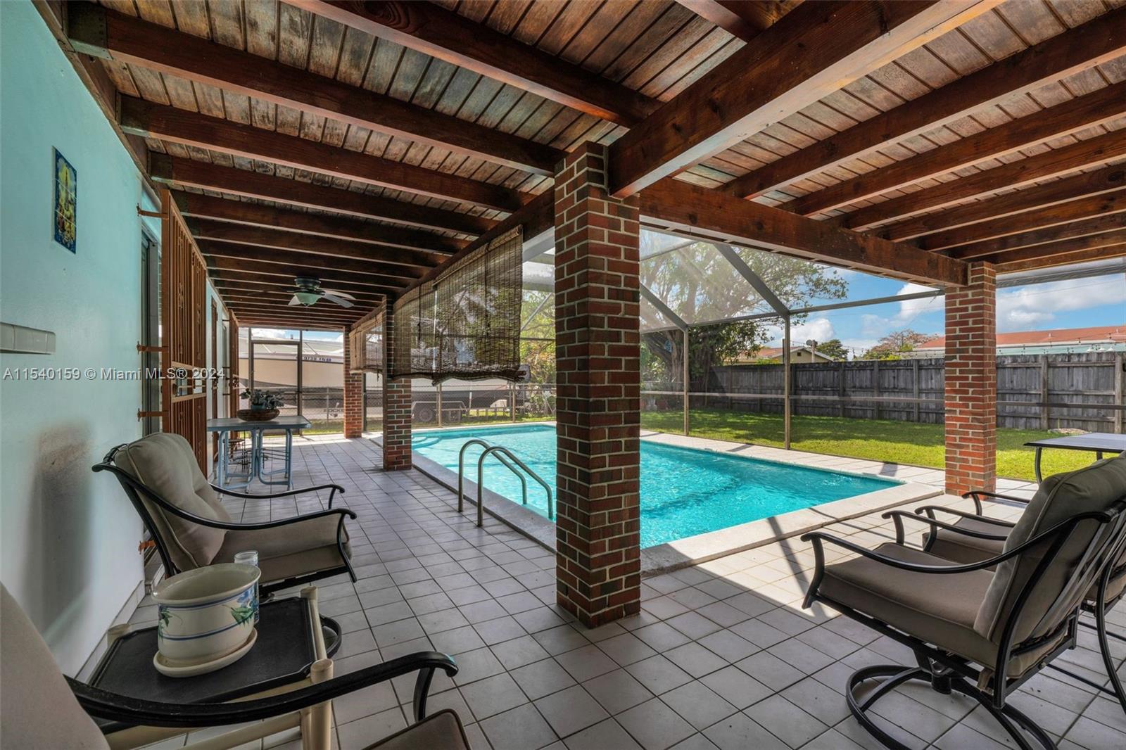 Westchester Miami, FL 33165 - Photo 26 of 30 a swimming pool with outdoor seating