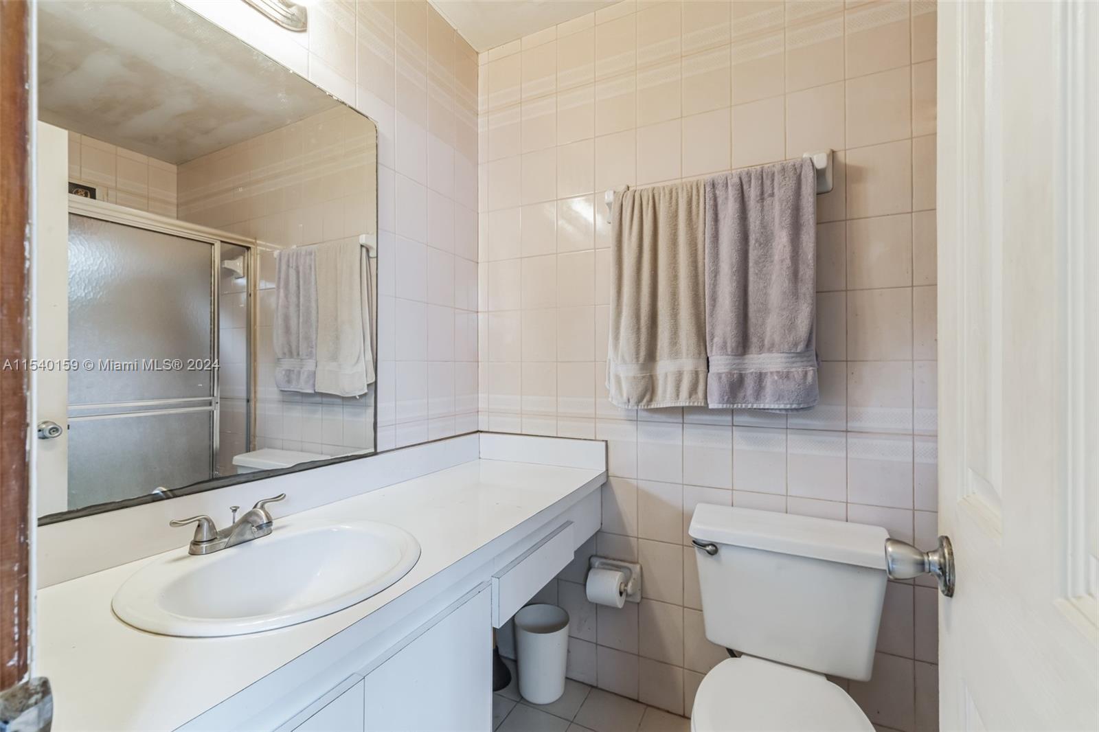 Westchester Miami, FL 33165 - Photo 28 of 30 a bathroom with a sink toilet and shower