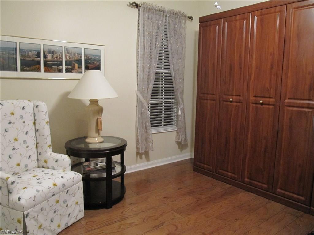 5160 Inagua Way Naples, FL 34119 - Photo 15 of 25 Second bedroom with built-in office and Queen Murphy Bed