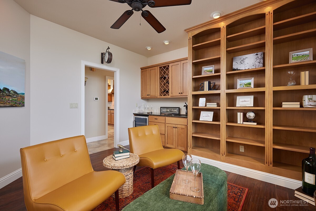 198 Narcissa Place Walla Walla, WA 99362 - Photo 9 of 40 a living room with furniture and a book shelf