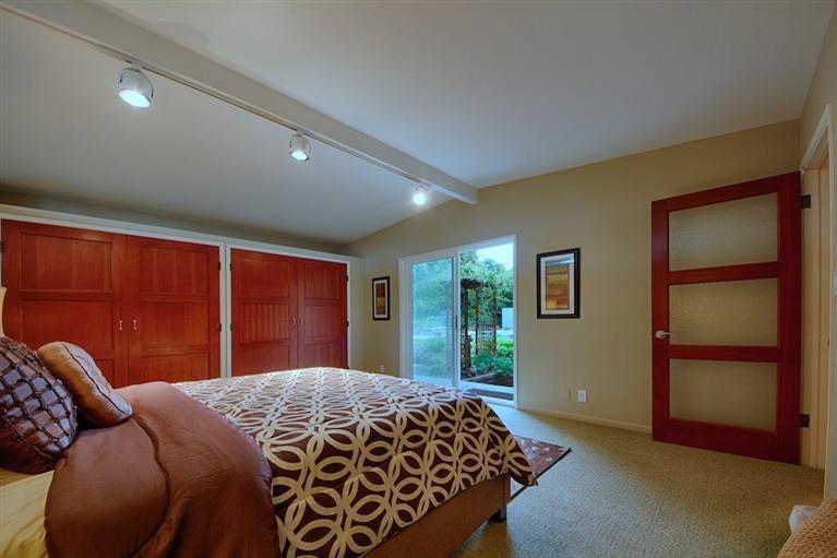 2985 Meyerloa Lane Pasadena, CA 91107 - Photo 13 of 30 a bedroom with a large bed and a large window