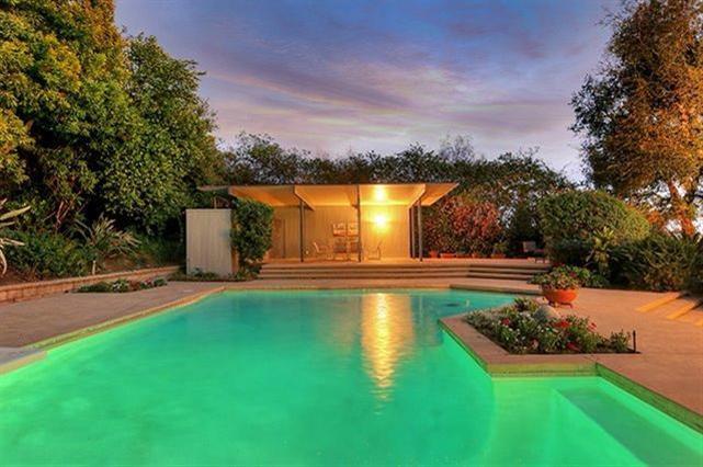 2985 Meyerloa Lane Pasadena, CA 91107 - Photo 24 of 30 a view of a swimming pool with an outdoor seating and a garden